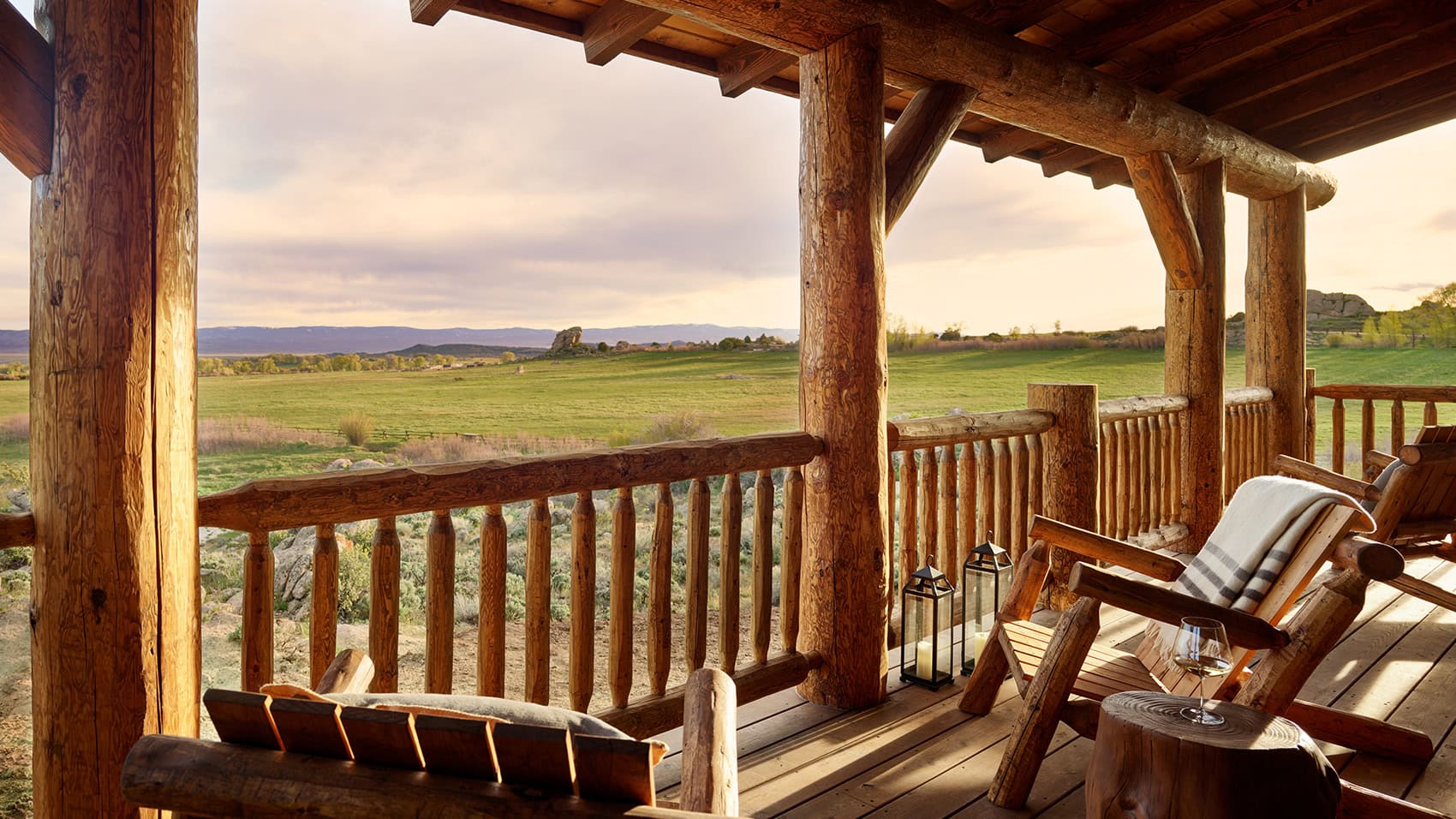 An cabin porch overlooking the outdoors at Brush Creek Ranch