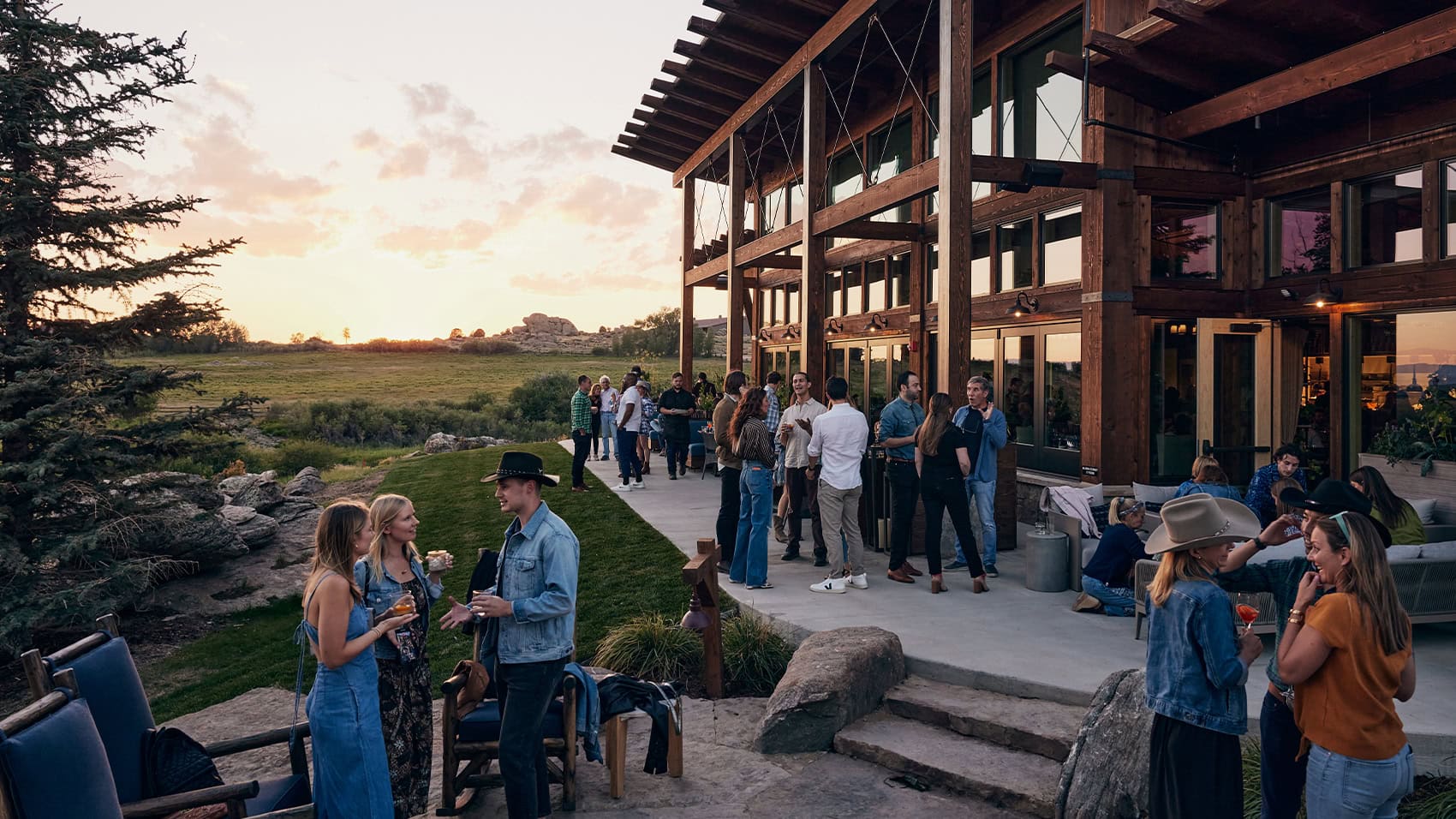 Guests enjoying each other's company on the outdoor patio